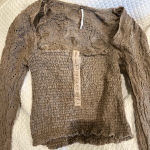 Free People Long-sleeve blouse. Lace details with button up design